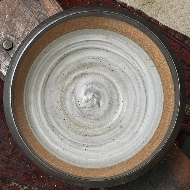 Vintage Large Studio Art Shino Glazed Stoneware Bowl, Signed. Large serving bowl with a brown glaze on the exterior with a...