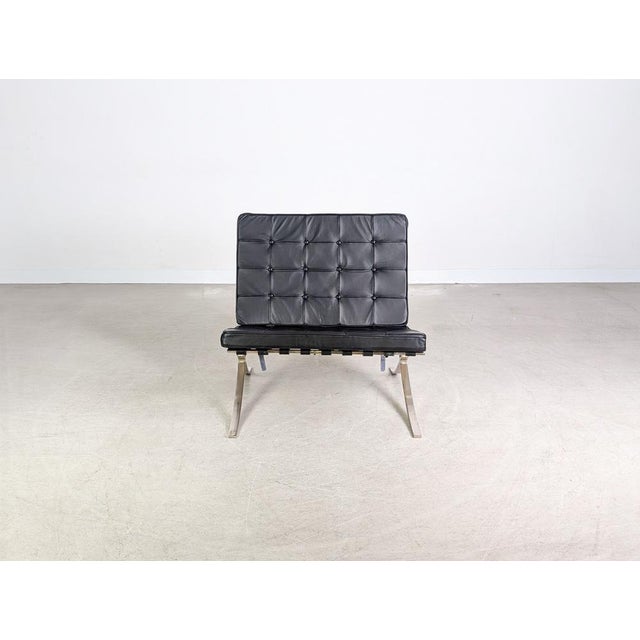 One of only two beautiful Barcelona armchairs by Knoll International from the 1970s for sale. The upholstery was renewed...