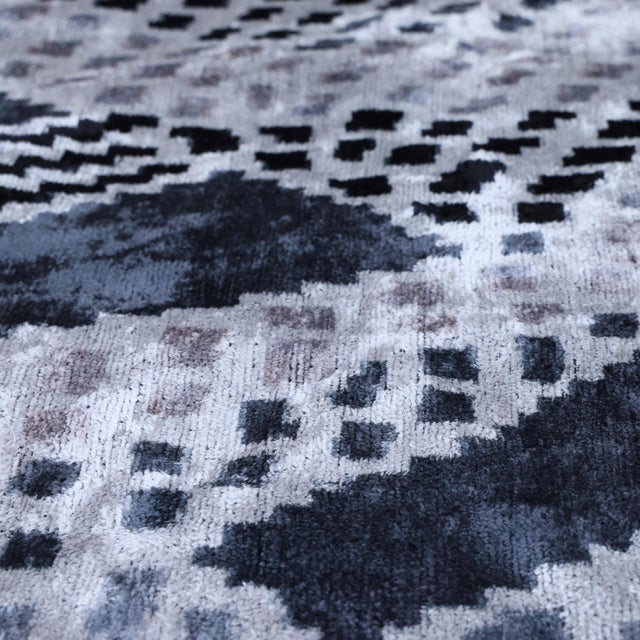 "Refined, architectural, and effortlessly sophisticated, this handmade silk velvet throw pillow brings contemporary...