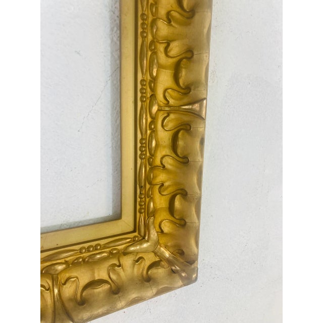 Beautifully detailed vintage frame, this piece has real gold gilding. The perfect way to dress a fine painting!Inside...