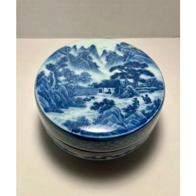 Offered is a beautiful circa 1930s Chinese Republic Period hand-painted blue and white porcelain powder box featuring...