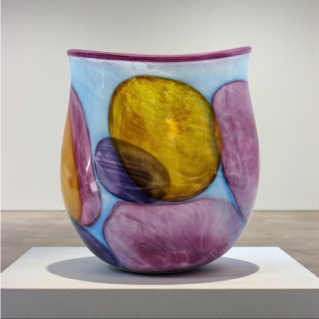 This hand-blown studio glass vase is attributed to Brubaker Glass, known for expressive colorwork and modern sculptural...