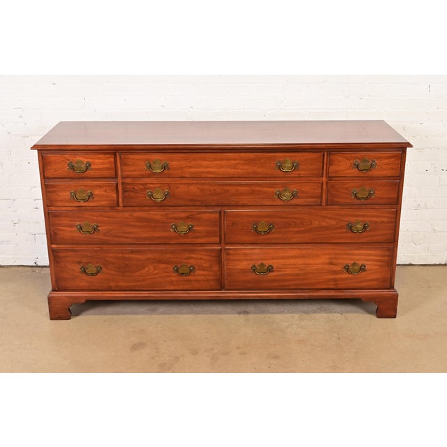 An exceptional Georgian or Chippendale style ten-drawer dresser or credenza By Henkel Harris USA, 1969 Solid wild black...