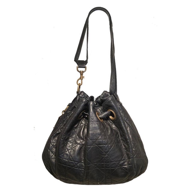 Christian Dior Black Leather Cannage Drawstring Shoulder Bag in very good condition. black cannage quilted leather trimmed...