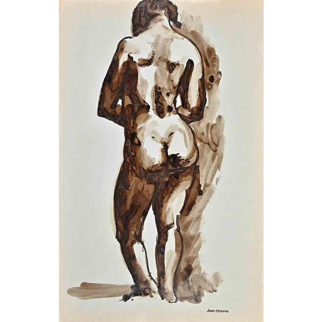 Nude of Woman is a watercolor and ink drawing realized by Jean Chapin in the 1950s. Signature stamp on the yellowed paper....
