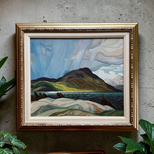 This is a reproduction print of Franklin Carmichael’s painting of Lake Wabagishik titled, "Summer Storm,” originally...