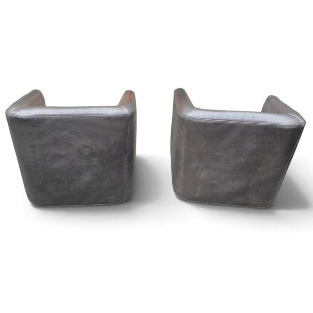 Offered as a sophisticated pair, these Restoration Hardware 1950s Italian Shelter Arm swivel chairs feature an elegant...