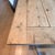 RH Salvaged Wood Gun Barrel Extension Dining Table Designed by artisan Timothy Oulton, this table is handcrafted from...