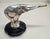 Jacques Cartier Art Deco Hood Ornament on Bakelite radiator cap. Bronze silvered.