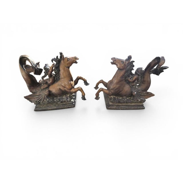 Spectacular pair of mythological bronze sculptures representing two putti riding magnificent seahorses. Rich in movement...