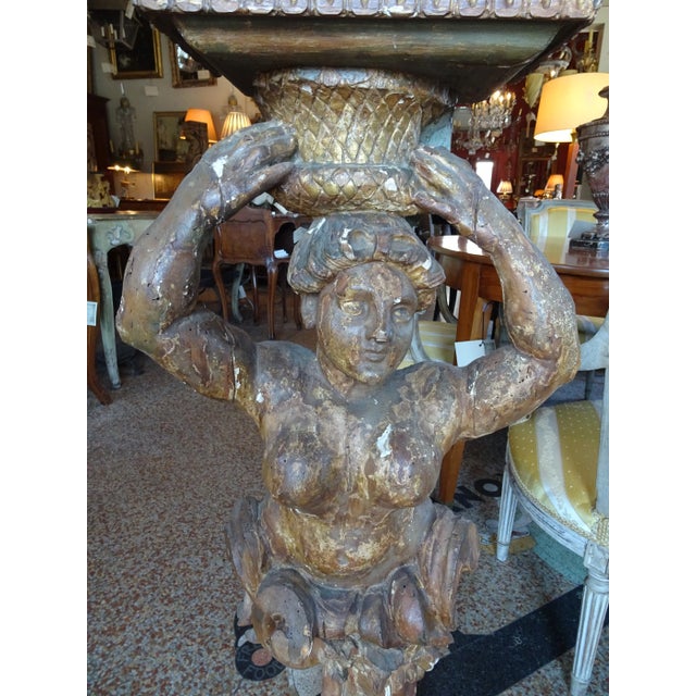 Pair of late 17th Century Italian caryatids. (A stone carving of a draped female figure, used as a pillar to support the...