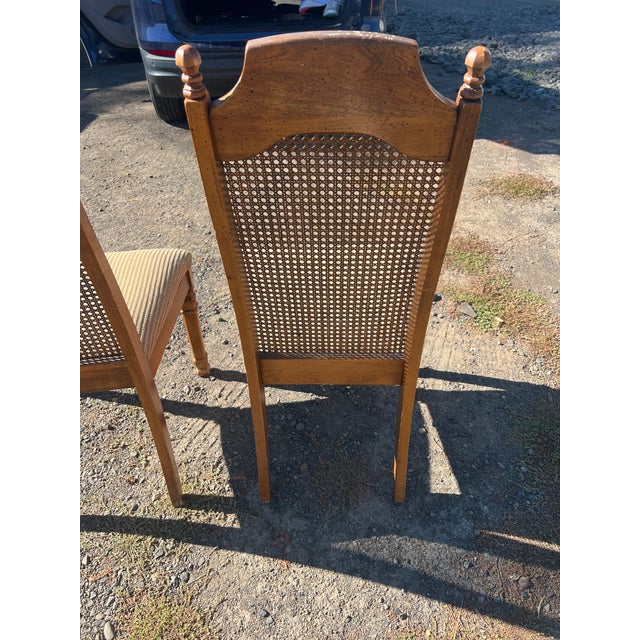 beautiful pair of mid-century vintage Singer Furniture side dining chairs, model 117-75, crafted by the Singer Furniture...