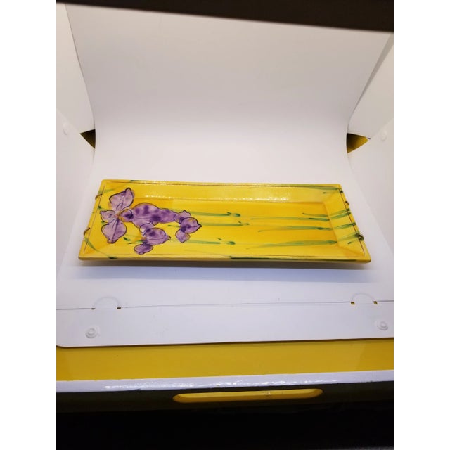 A beautiful, one-of-a-kind, heavy lacquer-painted yellow oblong platter made of red clay with handpainted purple iris' on...