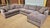 A three-piece Arhaus Camden sectional in the “Marble” gray color, offering broad proportions and a clean contemporary...