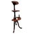 This 19th-century mahogany, three-tier demilune wine butler, also called a “dumbwaiter,” was historically used for self-...