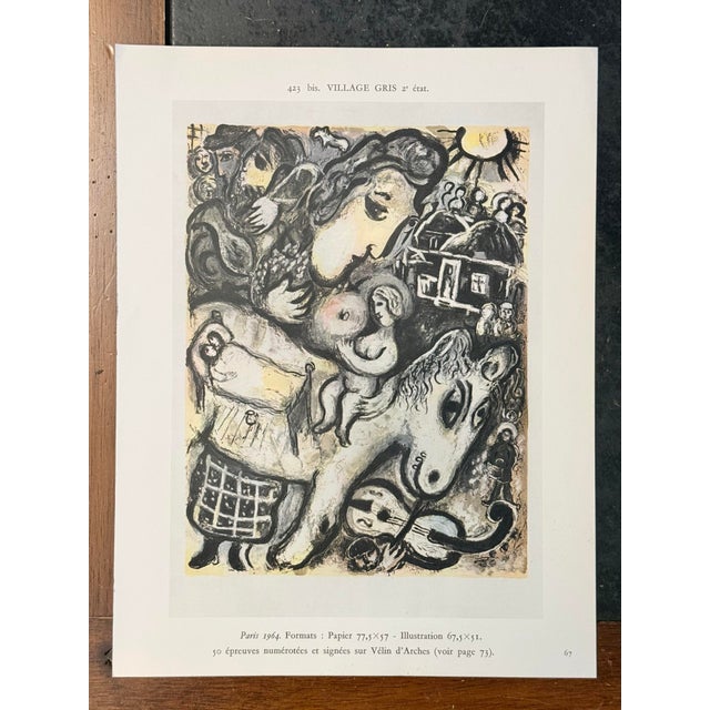 These are two vintage lithographic book plates on front and back of a single page, depicting Marc Chagall's 'Village Gris'...