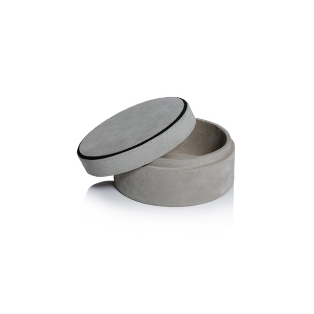 Elevate your organization with the refined texture and tailored appeal of the Arden Suede Leather Decorative Box. Wrapped...