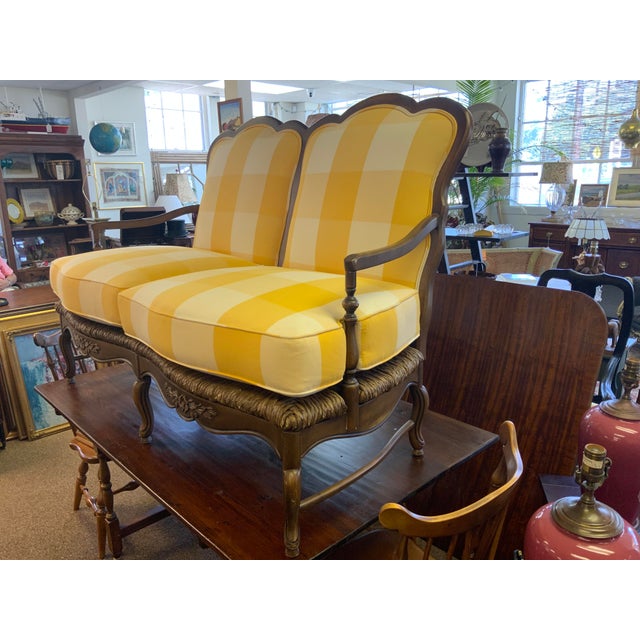 20th century Calico Corners French country style setee. Beautifully upholstered in a large yellow and white check, 5”...