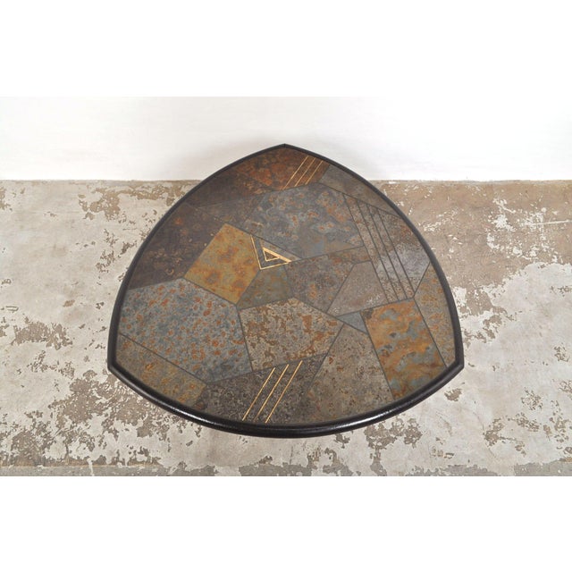 Beautiful coffee table by Dutch sculptor Paul Kingma (signed). The table has a unique convex triangular shape...