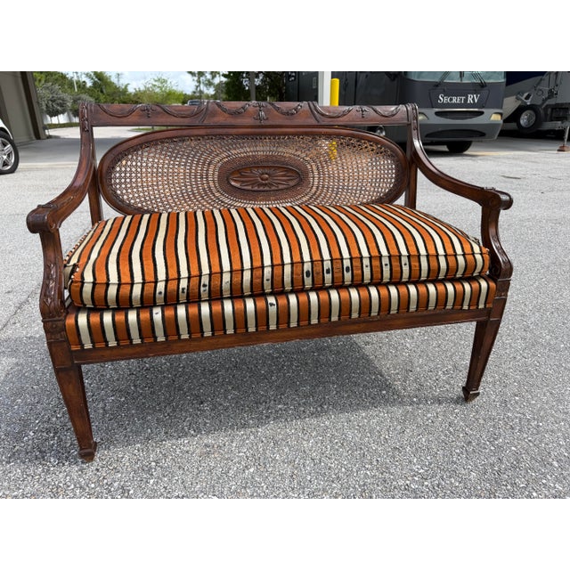 An elegant, Regency style vintage caned settee bench with luxurious stripped silk cushion. Bench can be used with or...