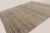 This oversized 12x14 contemporary solid and stripes rug, handwoven in wool and natural silk, features a softly striated...