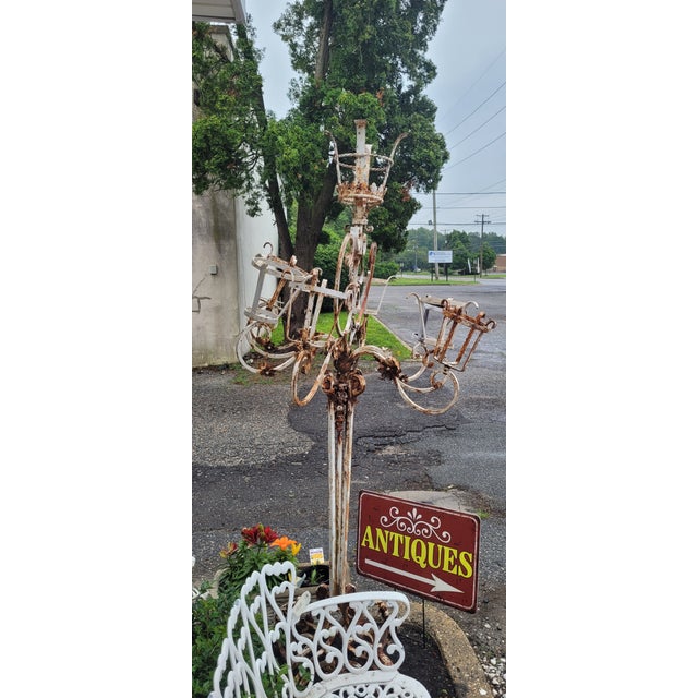 Fabulous Louis XV style tall iron outdoor planter. Measuring 79 inches tall by 30 deep and 43 inches wide. I can see this...