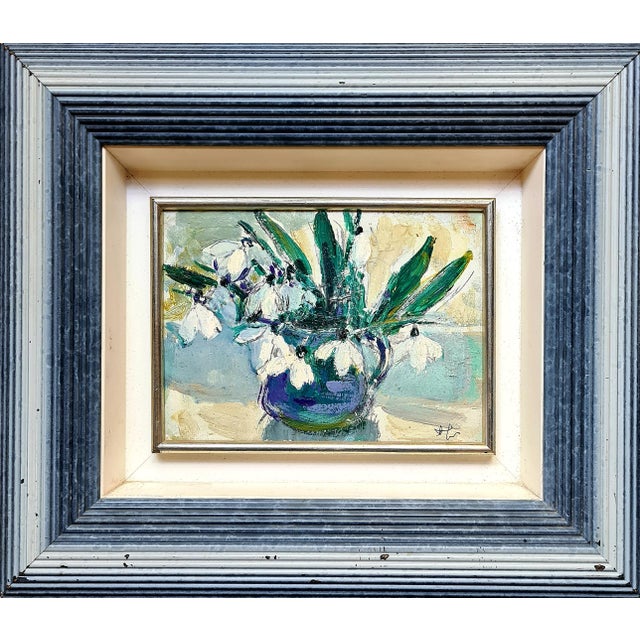 Snowdrops in a vase, oil on board painting. The work is signed bottom right but as yet undeciphered. Presented in a fine...