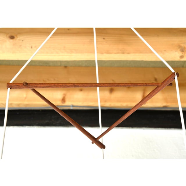 Brown Mid-Century Scandinavian Three-Drop Cascade Opaline Cased Glass Bowling Pin Lights in Teak, 1960s For Sale - Image 8 of 15