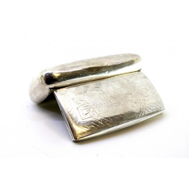 Silver Snuff Box with Engravings and Hinged Lid, in Very Good conditions. Designed from 2000 This piece has an attribution...
