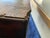 Dive into the elegance of late 19th to early 20th-century European craftsmanship with this ornate carved wooden trunk on...