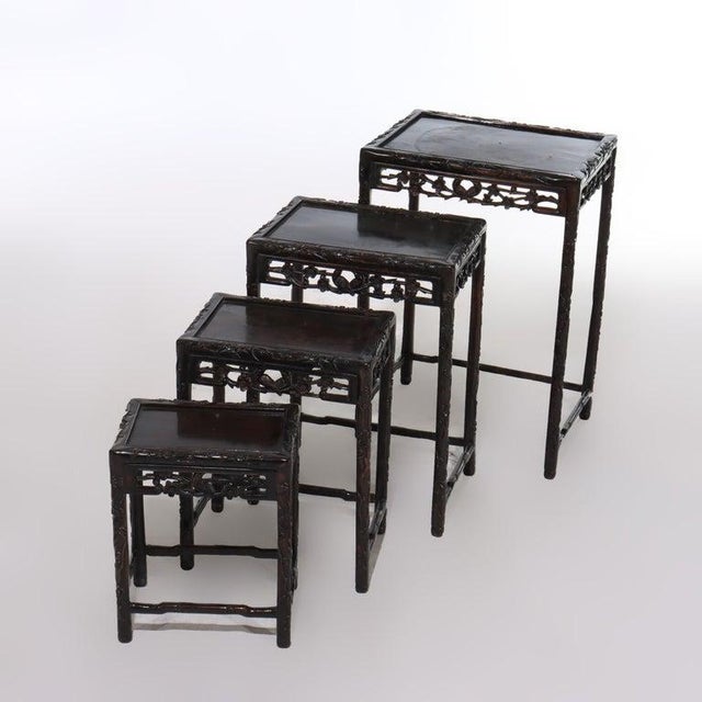Chinese Set of 4 Antique Chinese Floral & Figural Carved Hardwood Nesting Tables For Sale - Image 3 of 13