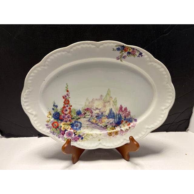 Charming vintage oval serving platter made in Japan, dating to the mid-century (circa 1950s). This beautiful porcelain...