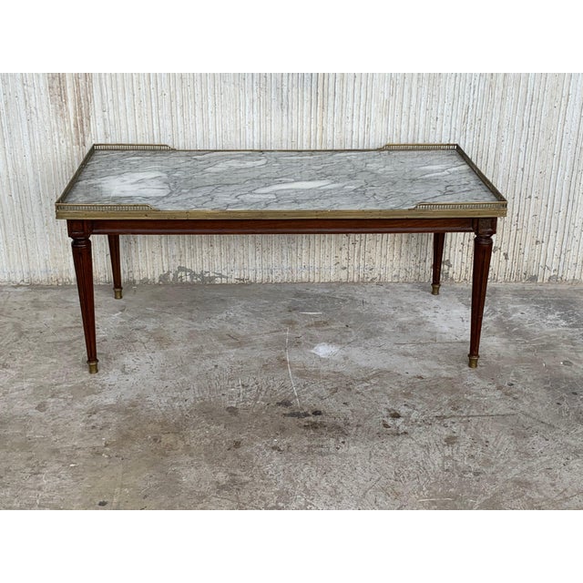 Unusual 19th century rectangular Bouillotte Louis XVI style table guéridon with fluted legs and grey and white marble.