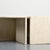 Set of four travertine drop tables forming a coffee table, made in Italy in the 1970s. Each piece features an L-shaped...