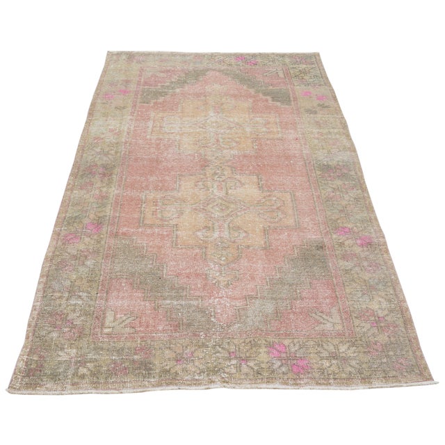 Hand-knotted with care using traditional rug making techniques, this wool rug blends timeless craftsmanship with a modern...