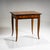 Elegant Biedermeier table featuring four gracefully curved legs and a small drawer. The surface is walnut-veneered, with...