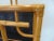 Mid Century Modern style magazine rack , bamboo with ebonized raffia divider and lower shelf