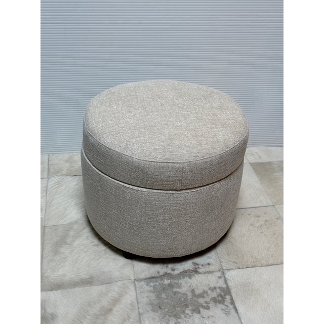 Design Plus Gallery presents the Oatmeal Infiniti Ottoman from Crate & Barrel. The ottoman channels 1930s Hollywood as it...