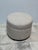 Design Plus Gallery presents the Oatmeal Infiniti Ottoman from Crate & Barrel. The ottoman channels 1930s Hollywood as it...