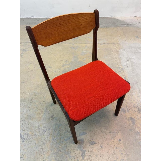 A timeless classic of Danish mid-century design: This upholstered chair by Erik Buch, crafted from solid teak, combines...