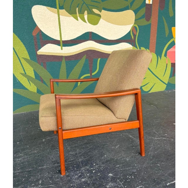 A nice Swedish mid century lounge chair with great lines and simplistic execution. In all original condition to be used as...