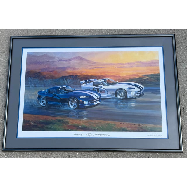 A great piece of 1990s automotive nostalgia, featuring the iconic blue-and-white Dodge Viper GTS alongside the Viper GTS-R...