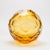 A radiant study in light and form, this hand-blown Murano globe vase in amber exudes warmth, brilliance, and artisanal...
