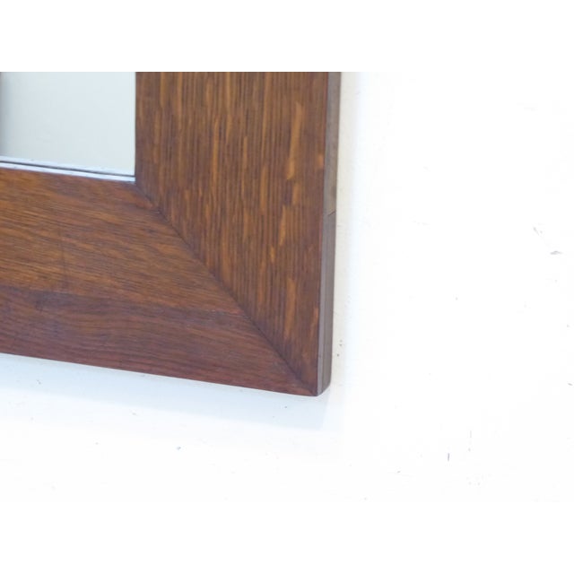 This solid oak mirror measures 36"H x 30"W.