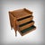 A beautiful solid walnut sideboard distinguished by its warm and refined presence, its gently curved silhouette softening...