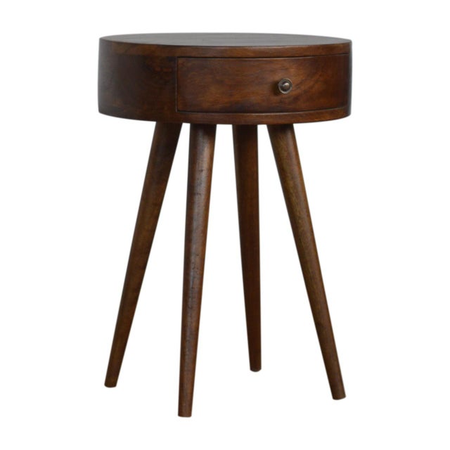 Designed with smooth, rounded lines, this compact table offers understated sophistication. Made from solid mango wood in a...
