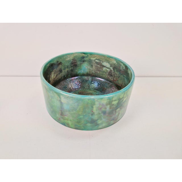 vintage Handmade ceramic bowl with green luster glaze 1960 Model: bowl Period: 1960 Measurements: W 24.5 cm x D 24.5 cm x...