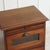This narrow oak shop cupboard likely dates from around 1900 and was originally used for the organized storage of small...