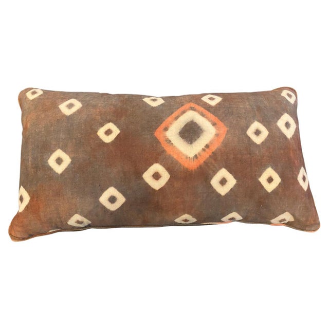 Beautiful antique textiles found in Toraja Land, South Sulawesi, are made into pillows with piping and concealed zippers....
