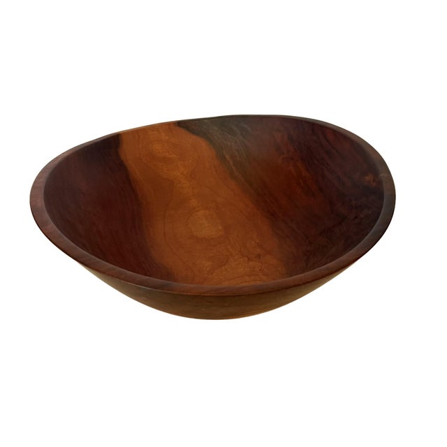 This is a modern hand-turned cherry bowl that follows the mid-century principles that flourished from the 1940's to...